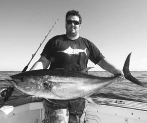 Scott Sharpe with a 27kg yellowfin taken wide of the Kiama Canyons.